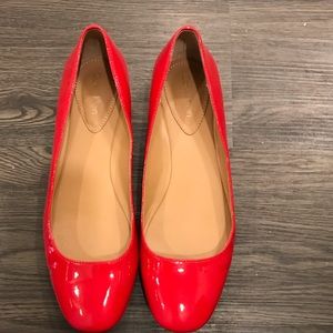CK red patent leather flats